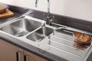 a stainless steel kitchen sink with granite worktop JKZAVGL