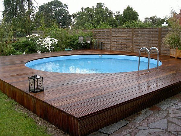 above ground pools modern above ground pool decks ideas wooden deck round pool lawn stone slabs FHKYEGJ