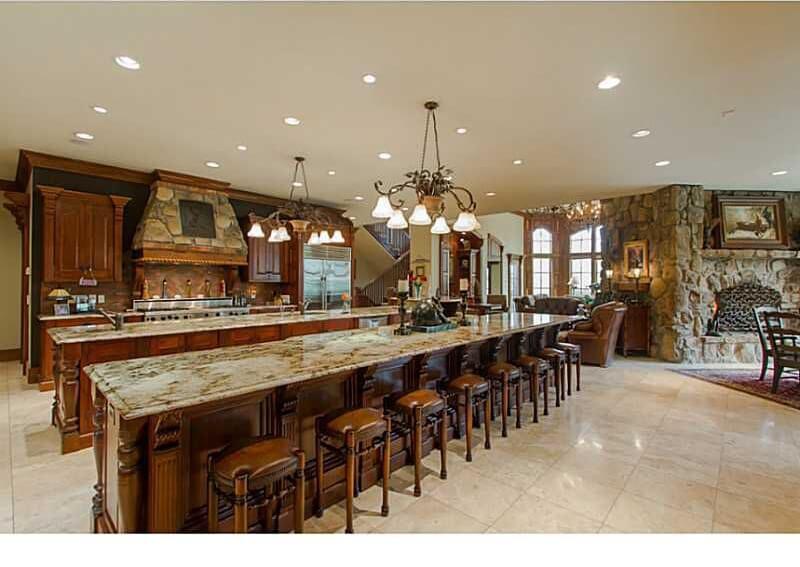 large kitchen island massive kitchen with two full-width islands. one island offers seating for  eight AIYDFNE