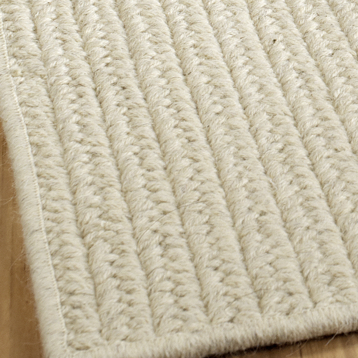 eco-friendly solid braided wool rugs cloudy_white NVHOHSV