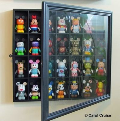 Good idea: using a shot glass display case to display Vinylmations .